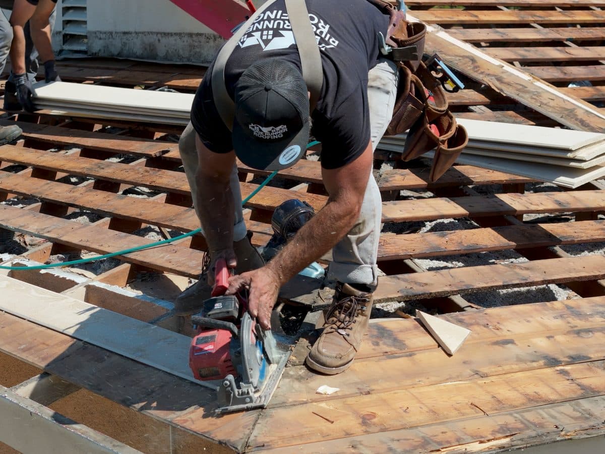 Roof tearoff exposing sheathing and roof framing